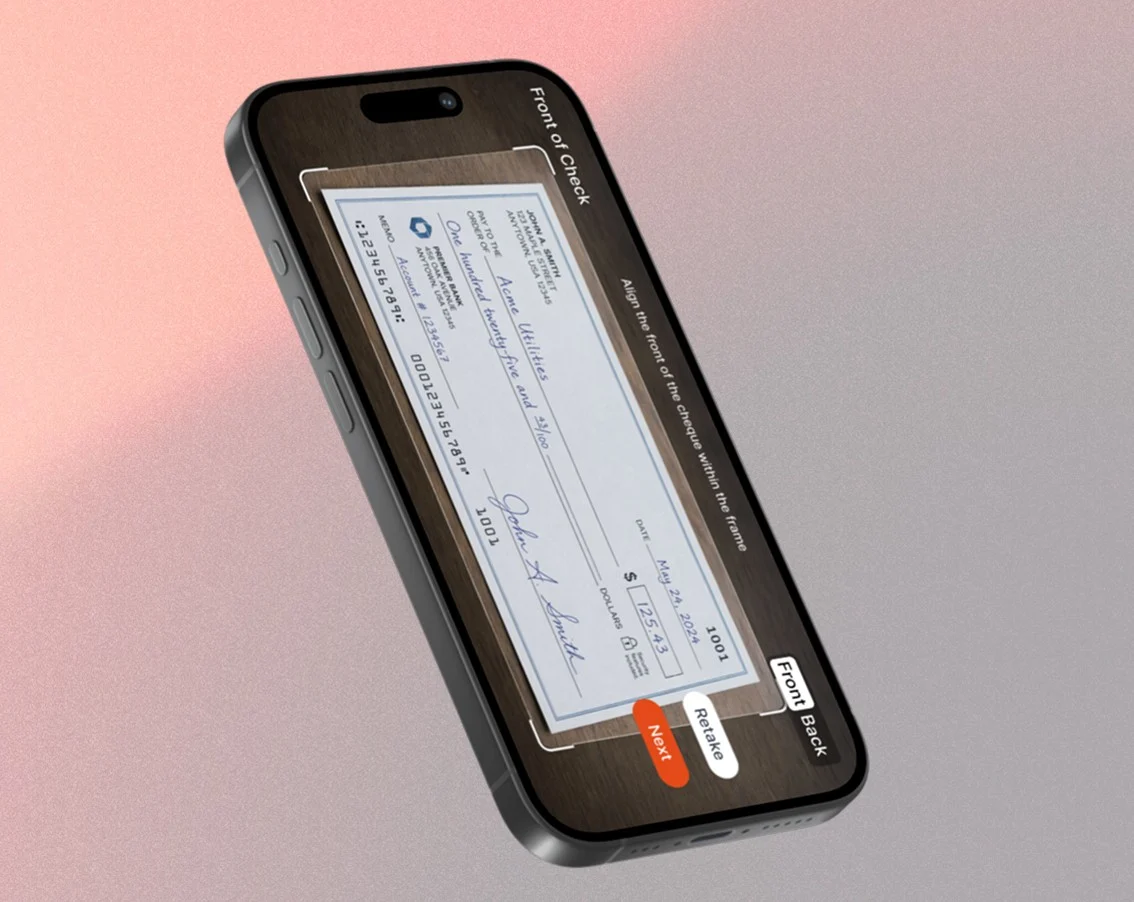 Technician collecting payment on a phone in the field